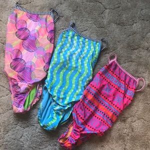 SOLD!! set of three dolfin uglies!! (size 28)